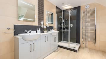Master Room | Bathroom | Designer toiletries, hair dryer, bathrobes, slippers