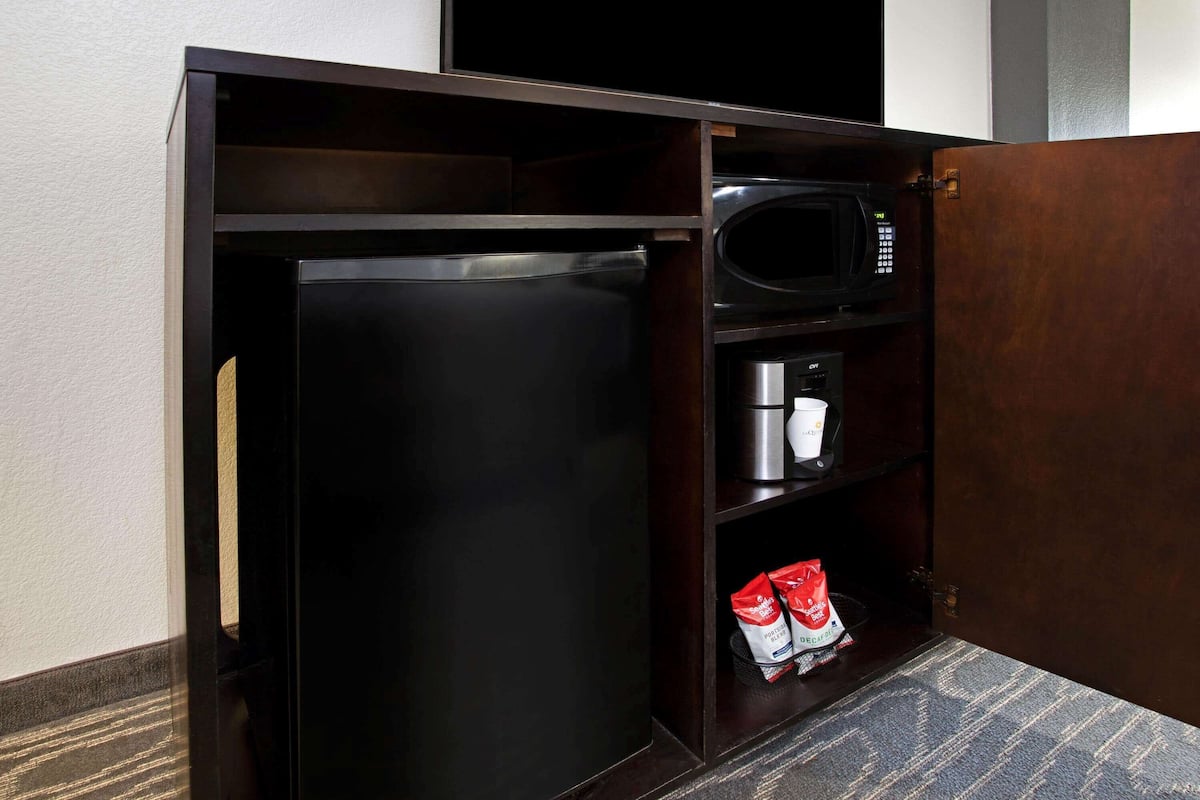 premium bedding, pillow-top beds, desk, blackout curtains