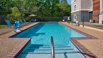 Outdoor pool, open 10:00 AM to 10:00 PM, pool umbrellas, sun loungers