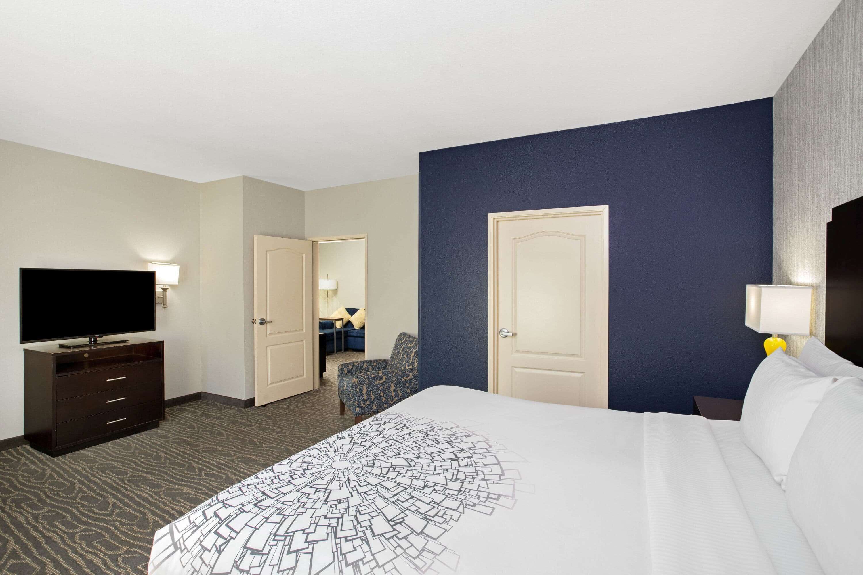 premium bedding, pillow-top beds, desk, blackout curtains