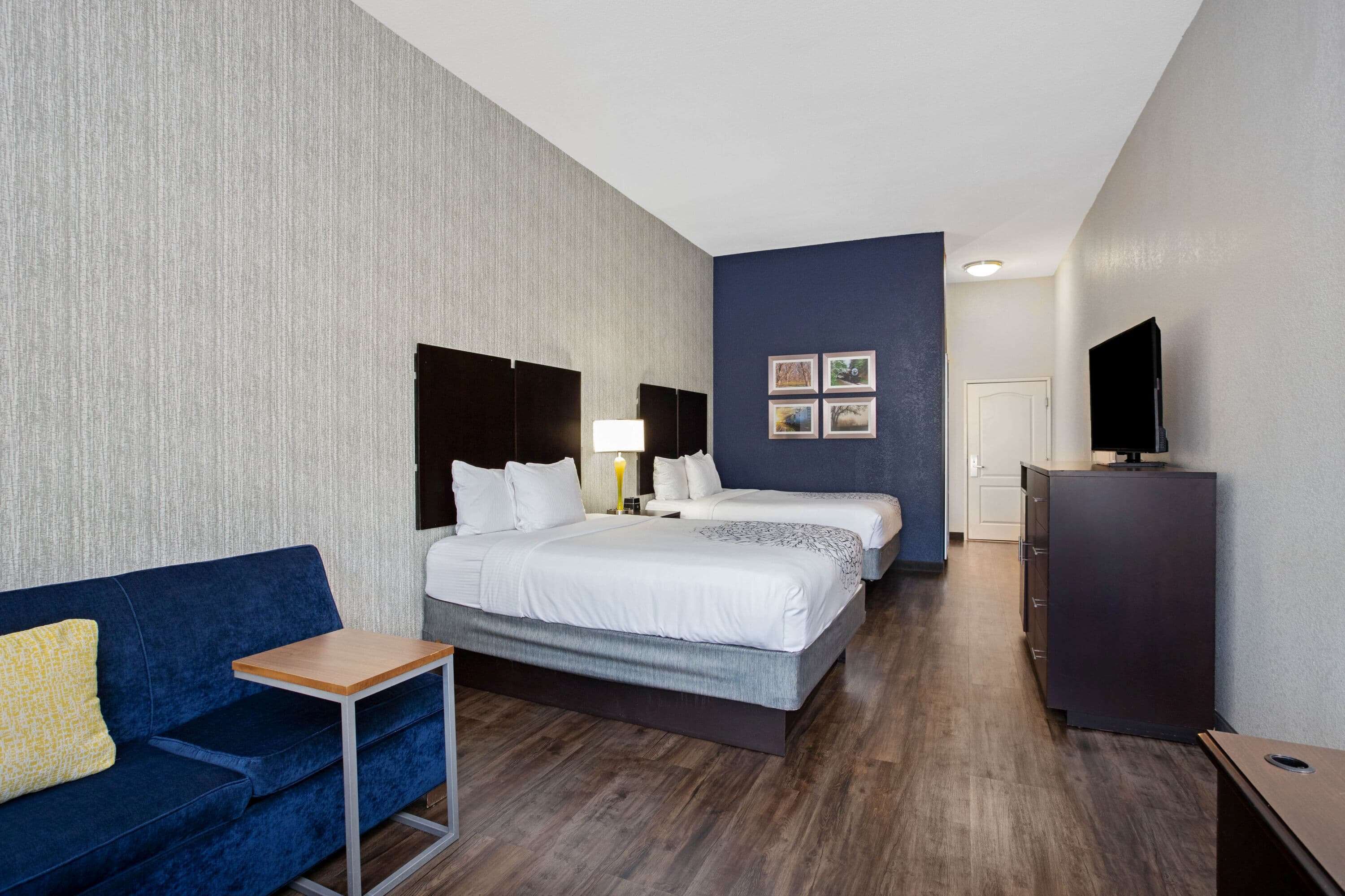 premium bedding, pillow-top beds, desk, blackout curtains