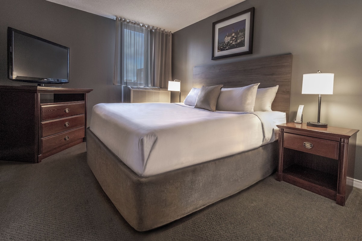 One Queen Bedroom Suite | 1 bedroom, pillowtop beds, in-room safe, desk