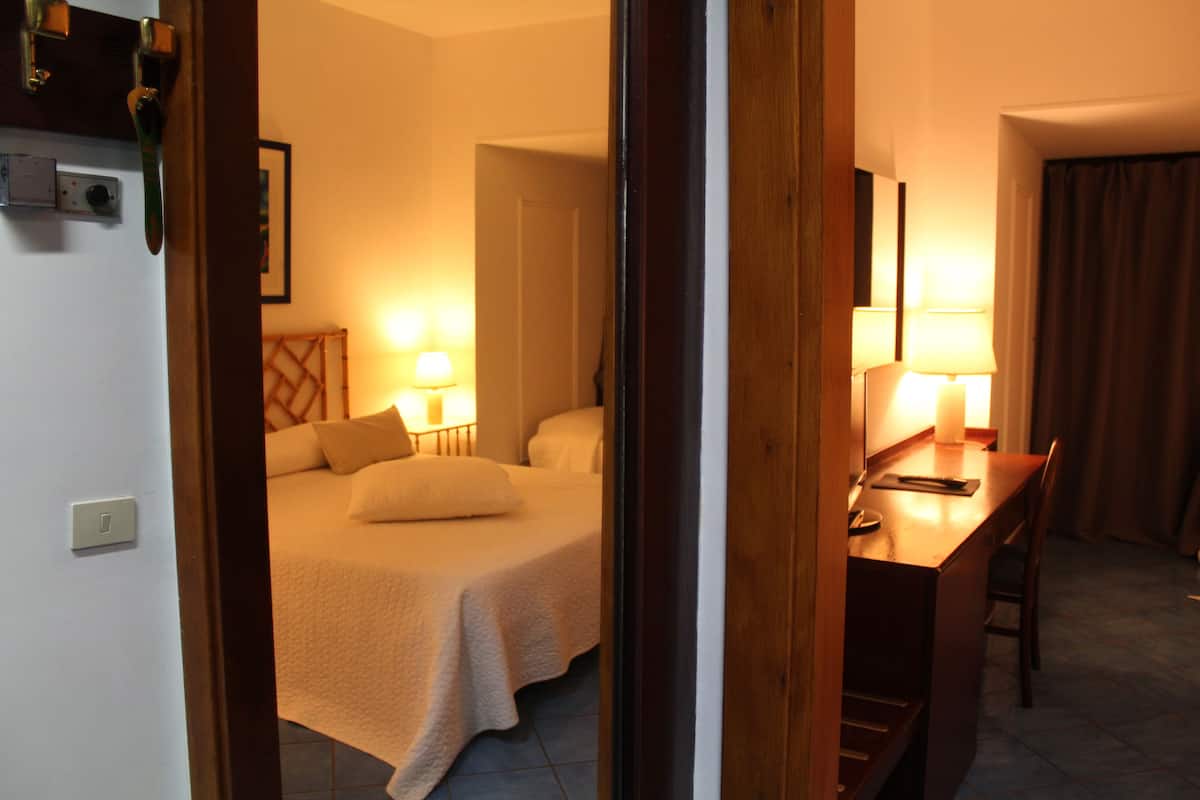 family quadruple room | premium bedding, minibar, in-room safe, desk