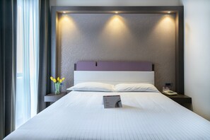 Ropa de cama de alta calidad y minibar 