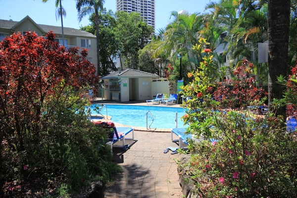 Outdoor pool, open 7:30 AM to 9:30 PM, pool loungers