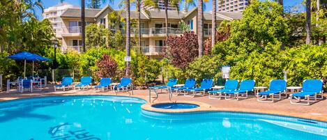 Outdoor pool, open 7:30 AM to 9:30 PM, pool loungers