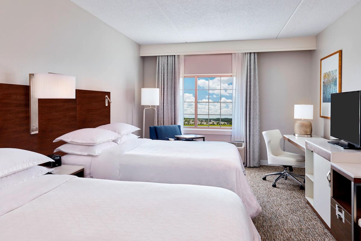 hypo-allergenic bedding, pillow-top beds, in-room safe, desk