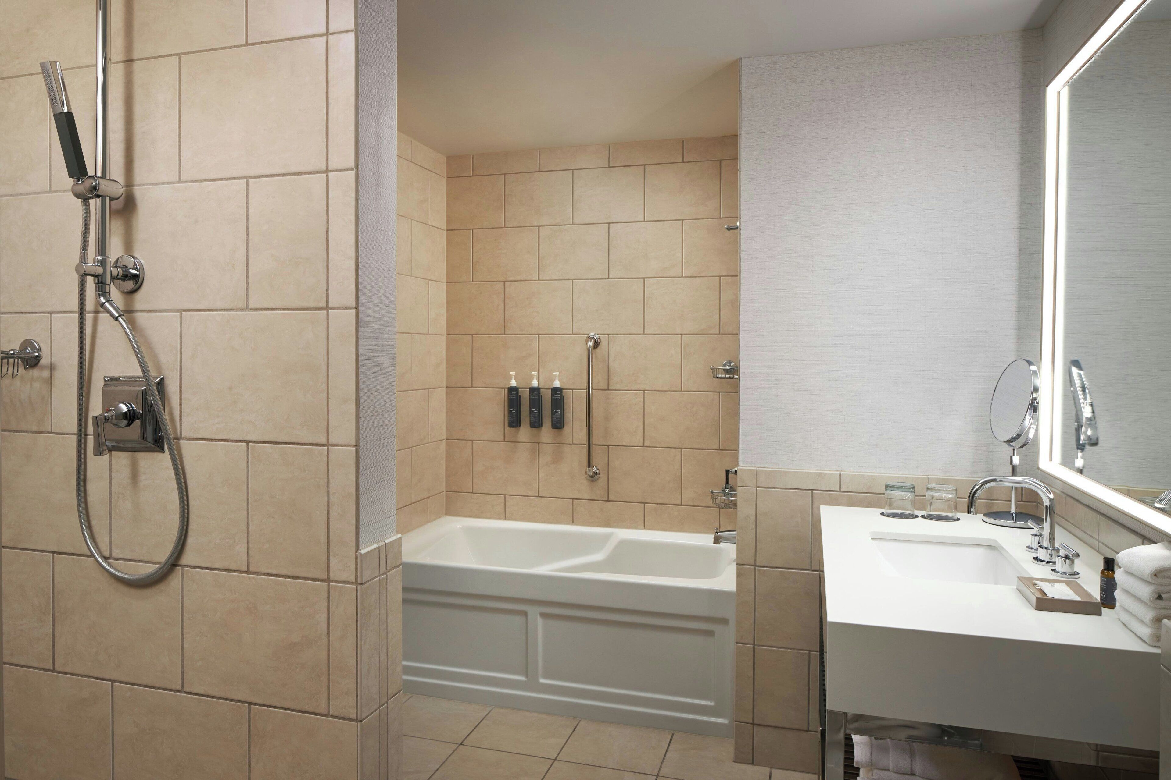 designer toiletries, hair dryer, bathrobes, towels