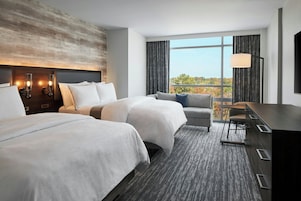 Premium bedding, down comforters, pillowtop beds, in-room safe