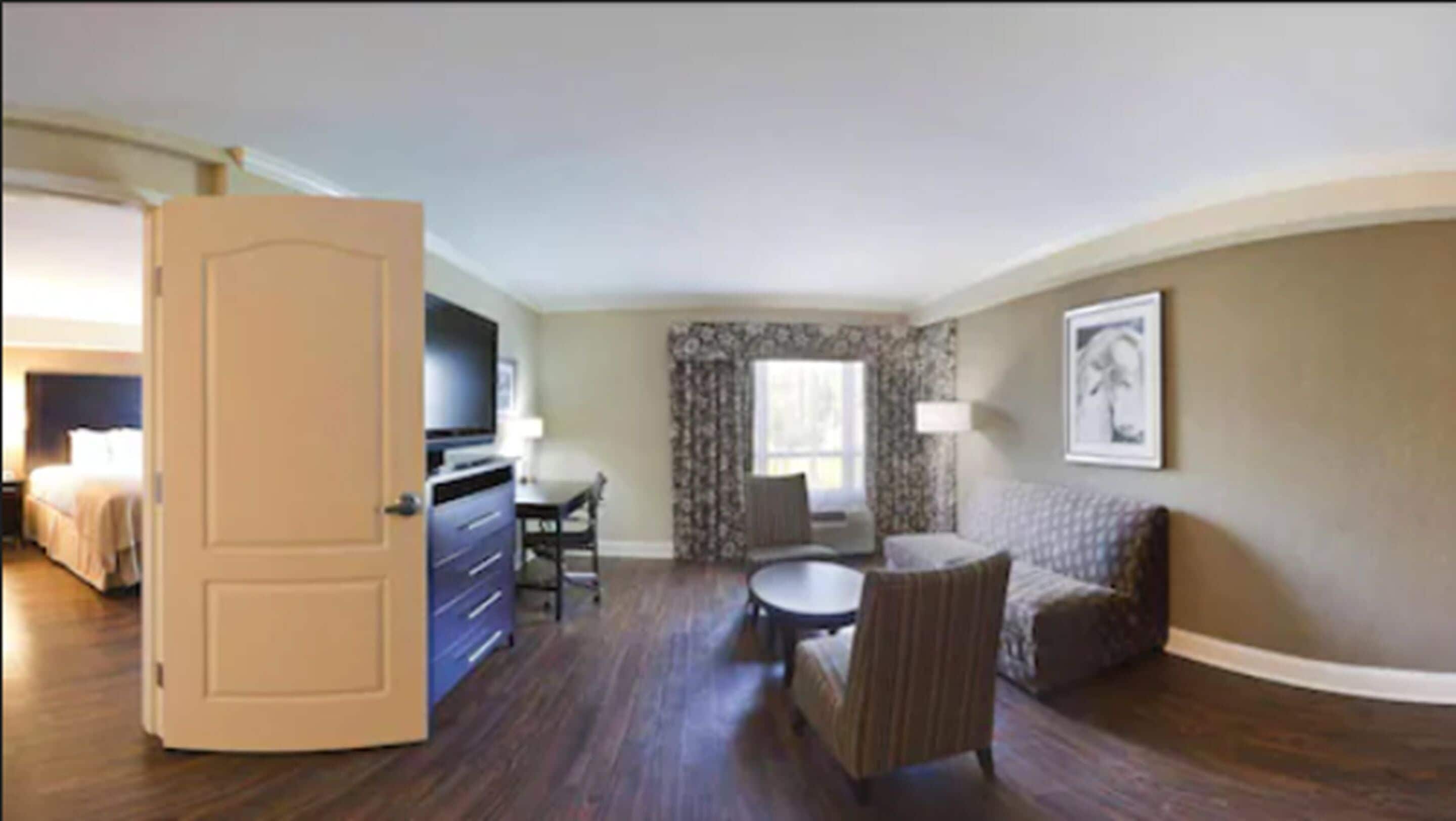 Suite, 2 Bedrooms | Living room | Flat-screen TV, MP3 dock