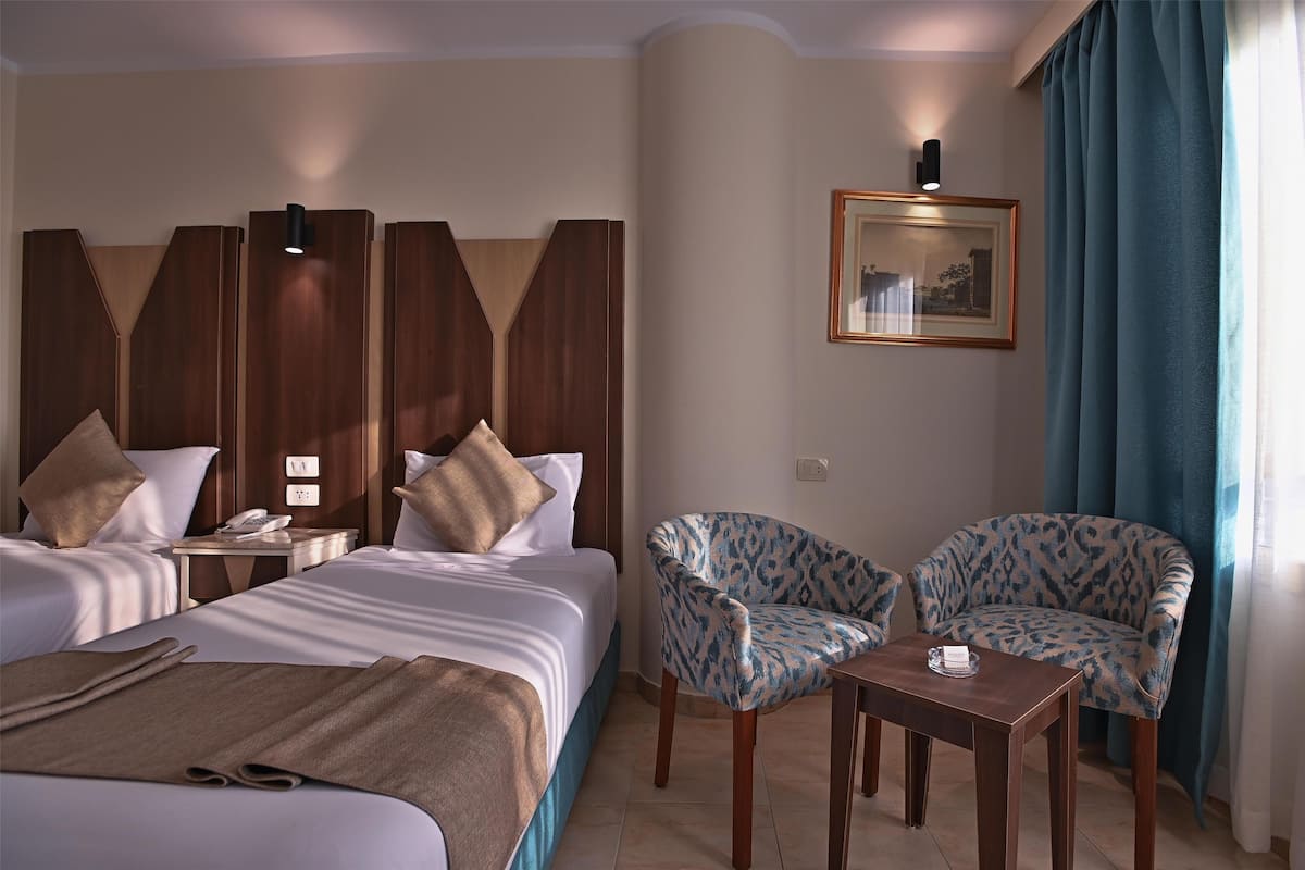Triple Room | 1 slaapkamer, lakens van Egyptisch katoen, luxe beddengoed, een minibar