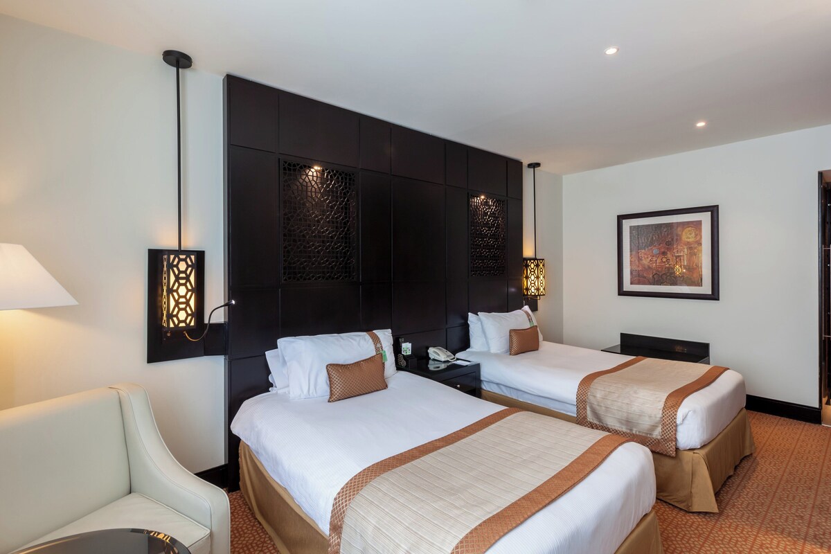 Memory-foam beds, minibar, in-room safe, desk