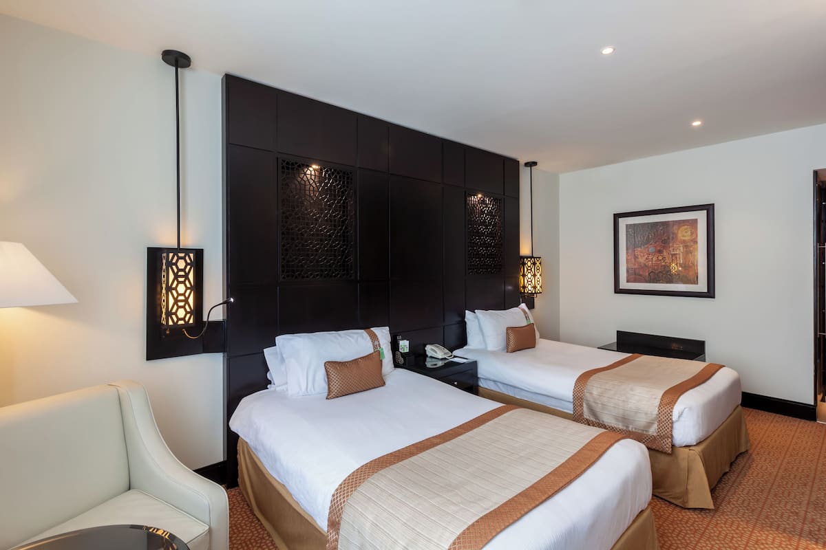 Memory-foam beds, minibar, in-room safe, desk