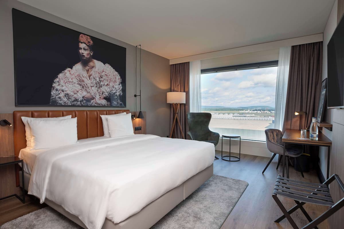Premium Room (Airfield View) | 1 bedroom, hypo-allergenic bedding, in-room safe, desk