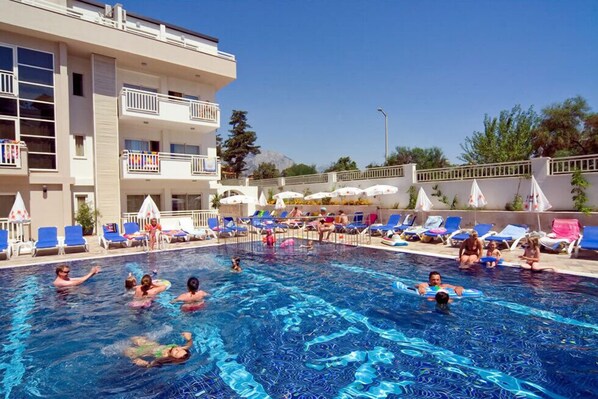 Outdoor pool, pool umbrellas, pool loungers