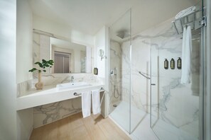 Bathtub, eco-friendly toiletries, hair dryer, bathrobes