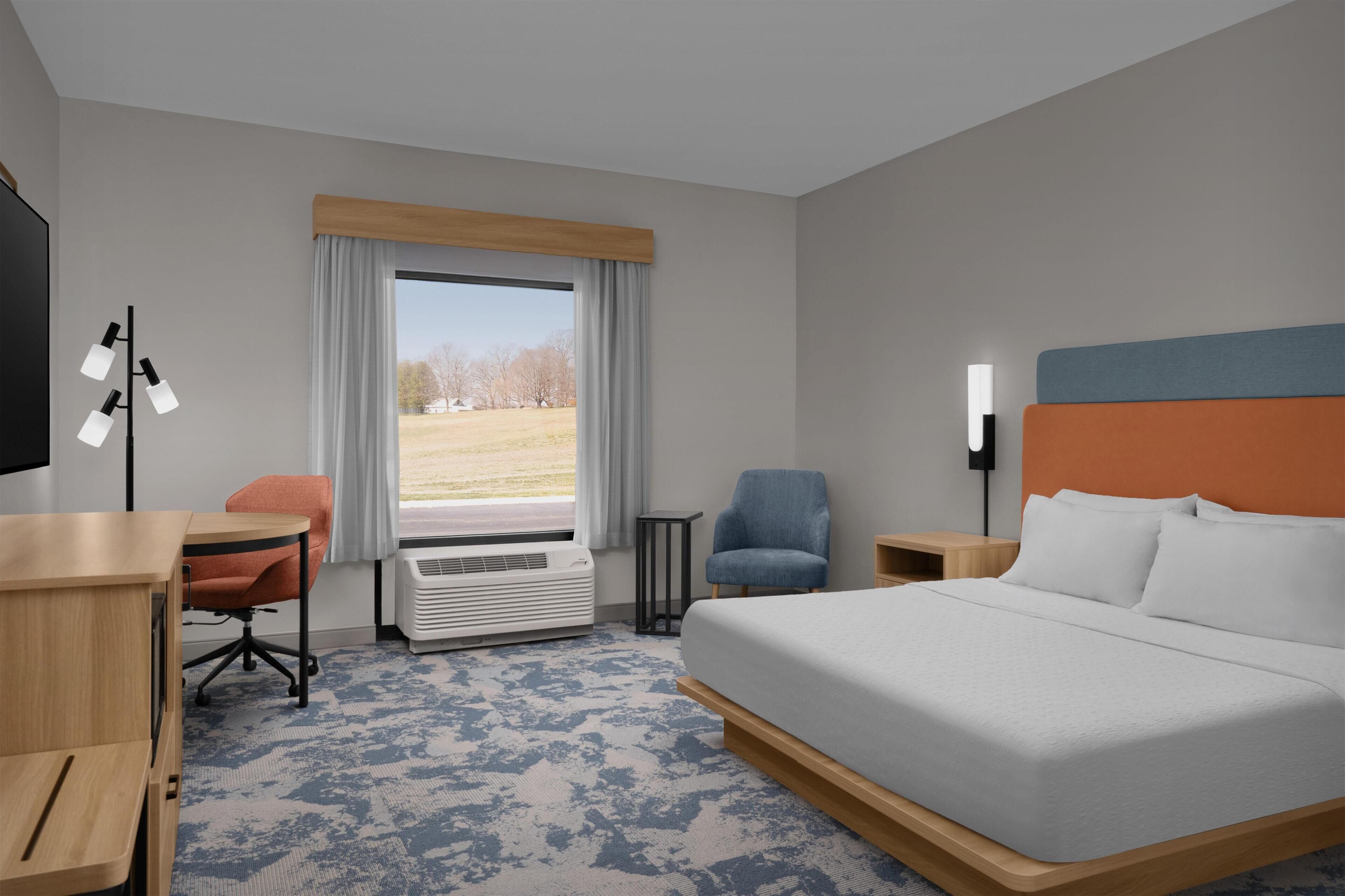 Habitación, 1 cama King size, con acceso para personas discapacitadas, para no fumadores | Escritorio, cortinas blackout y tabla de planchar con plancha 