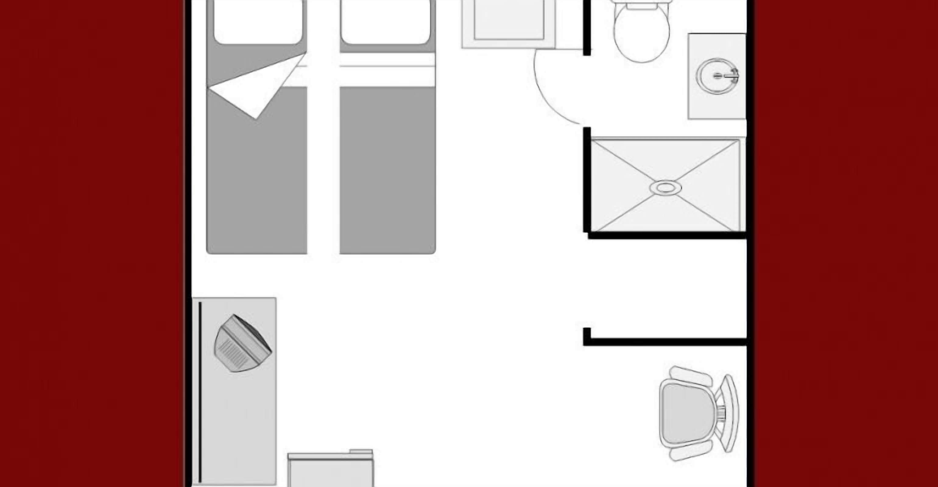 A hotel room layout with a bed, a desk, a chair, a wardrobe, a bathroom with a toilet, a sink, and a mirror.