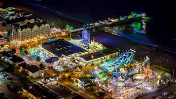 On the beach, white sand, sun-loungers, beach umbrellas