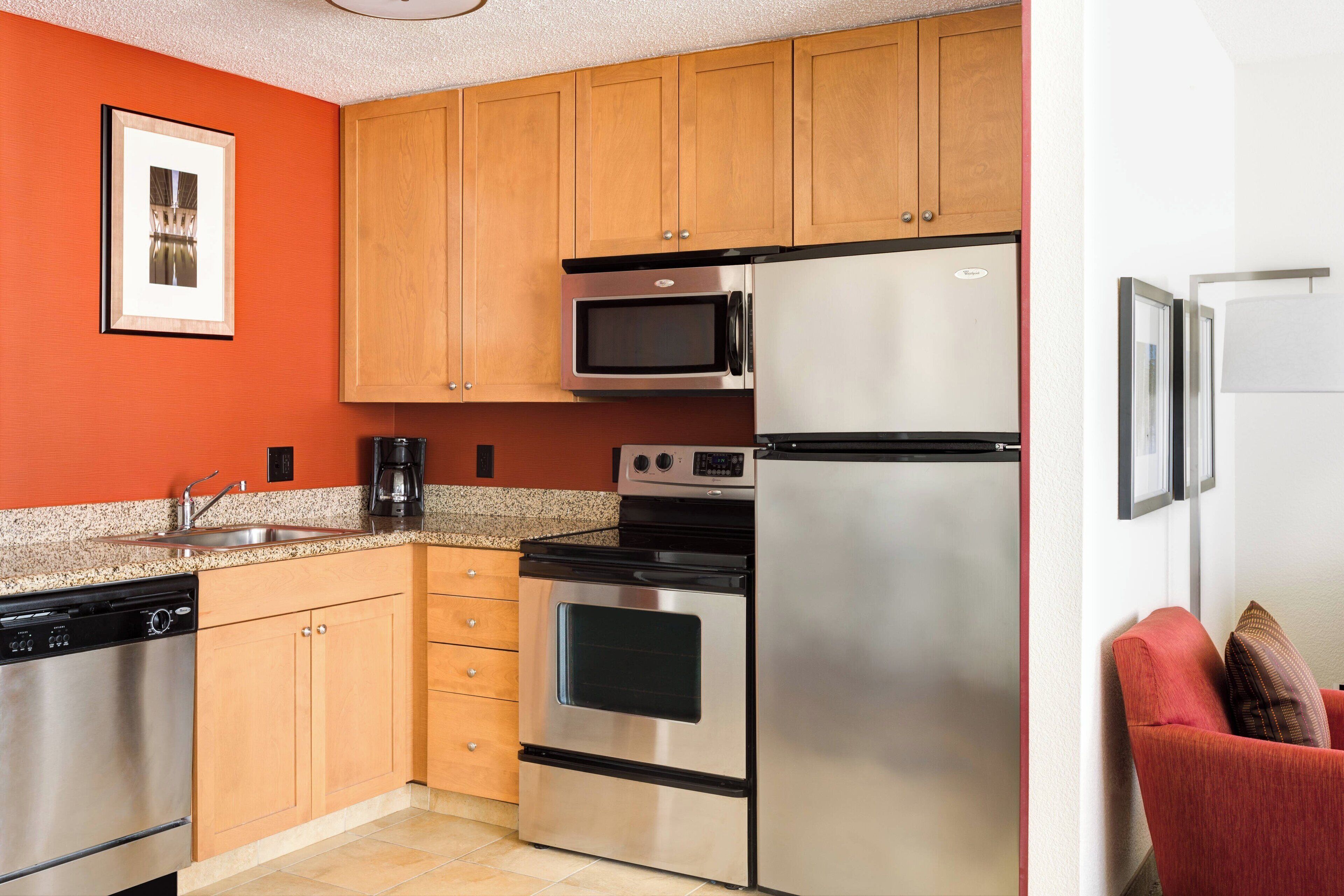 full-sized fridge, microwave, stovetop, dishwasher