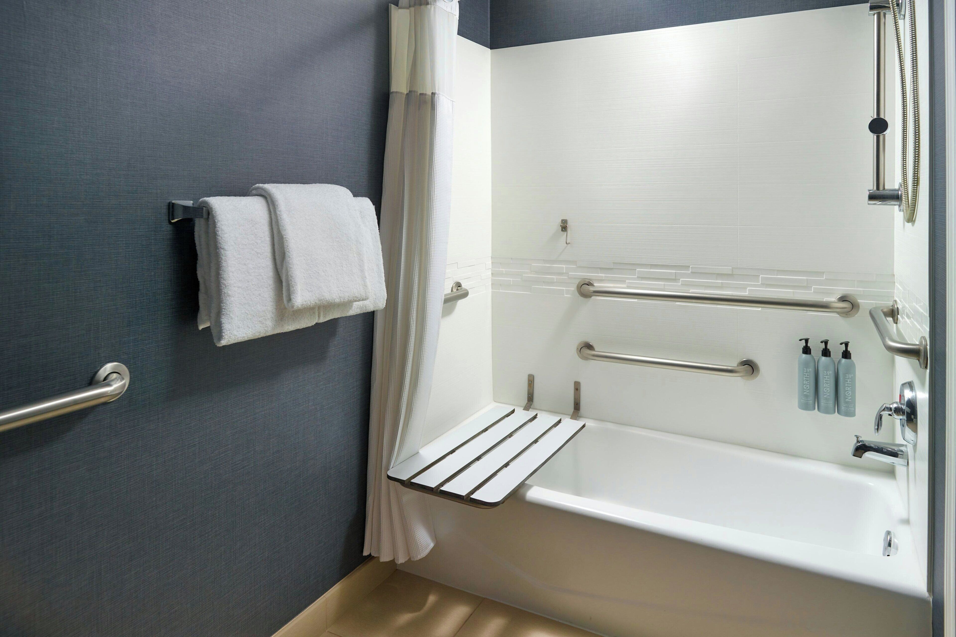 combined shower/bathtub, free toiletries, hair dryer, towels