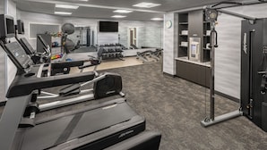A gym with treadmills, weight machines, and free weights. - Fairfield Inn & Suites by Marriott Rome (Rome)