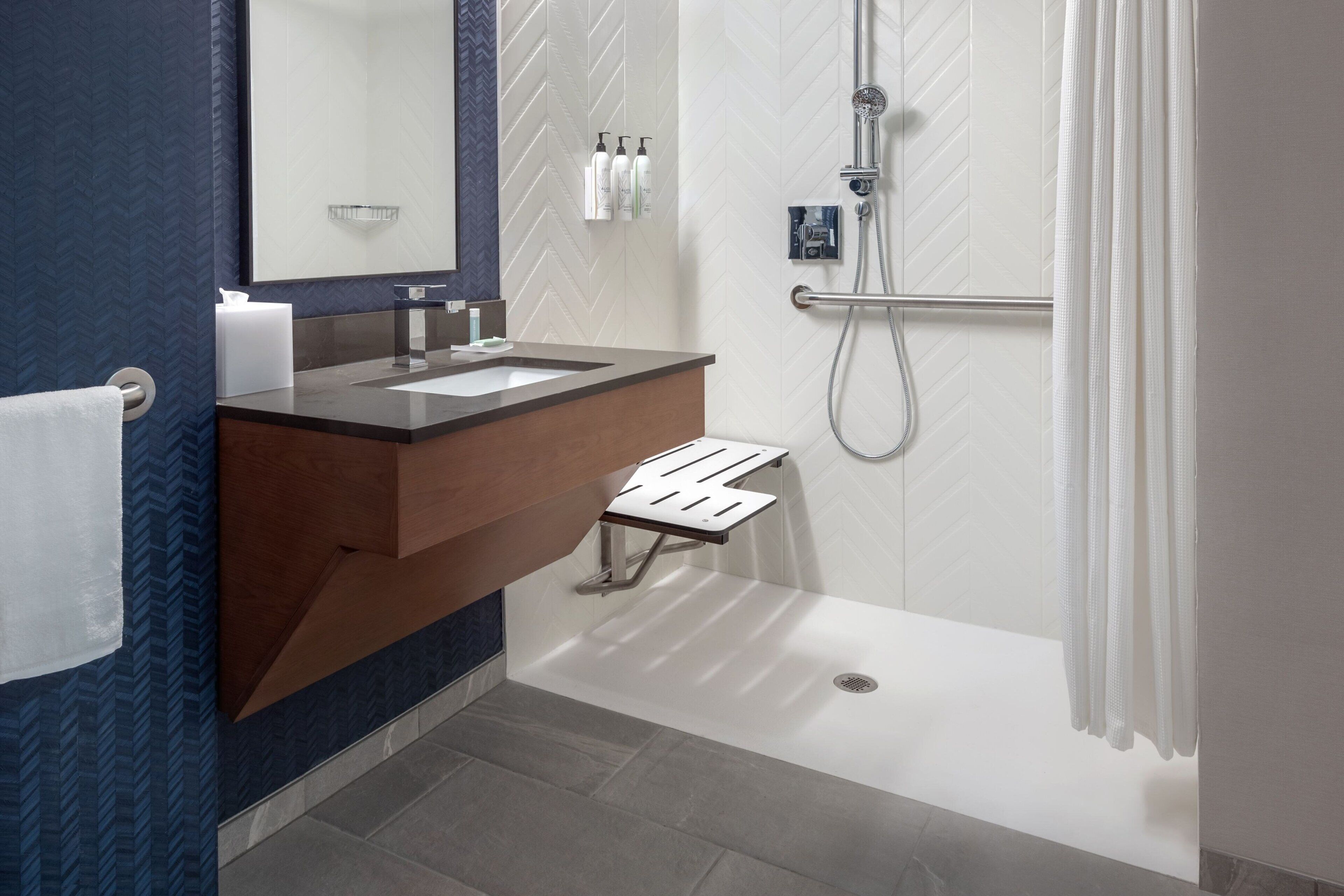 combined shower/bathtub, free toiletries, hair dryer, towels