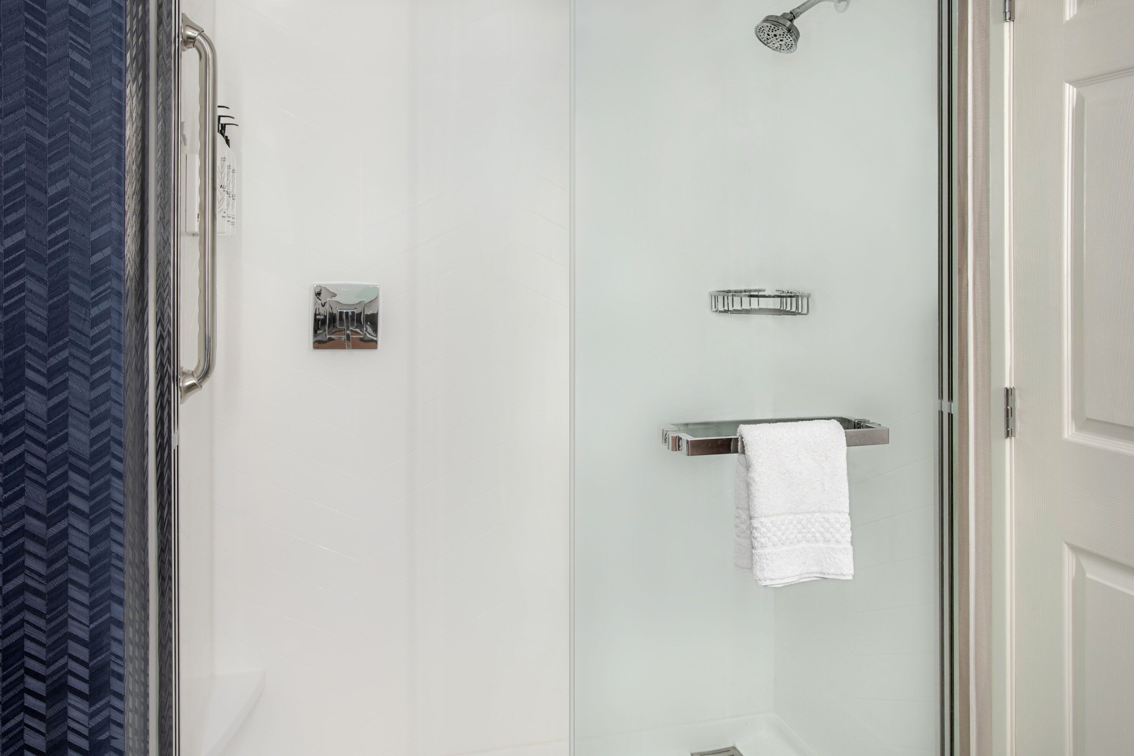 combined shower/bathtub, free toiletries, hair dryer, towels