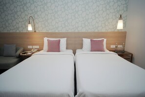 Habitación superior, 2 camas individuales | Ropa de cama de alta calidad y minibar