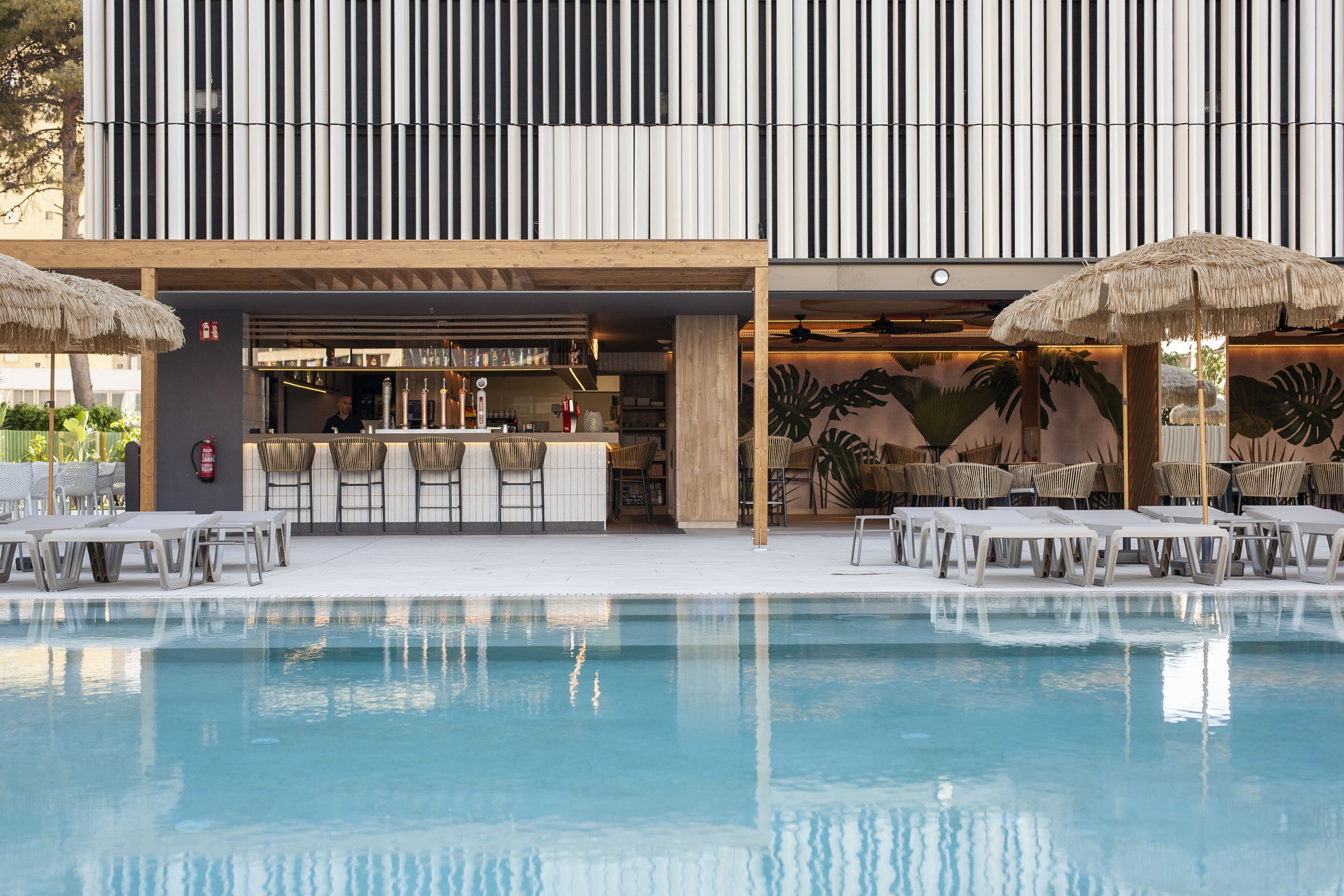 2 outdoor pools, open 9:00 am to 8:00 pm, pool loungers