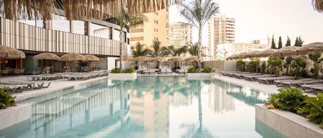 2 outdoor pools, open 9:00 AM to 8:00 PM, pool loungers