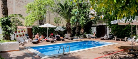 Outdoor pool, pool umbrellas, pool loungers