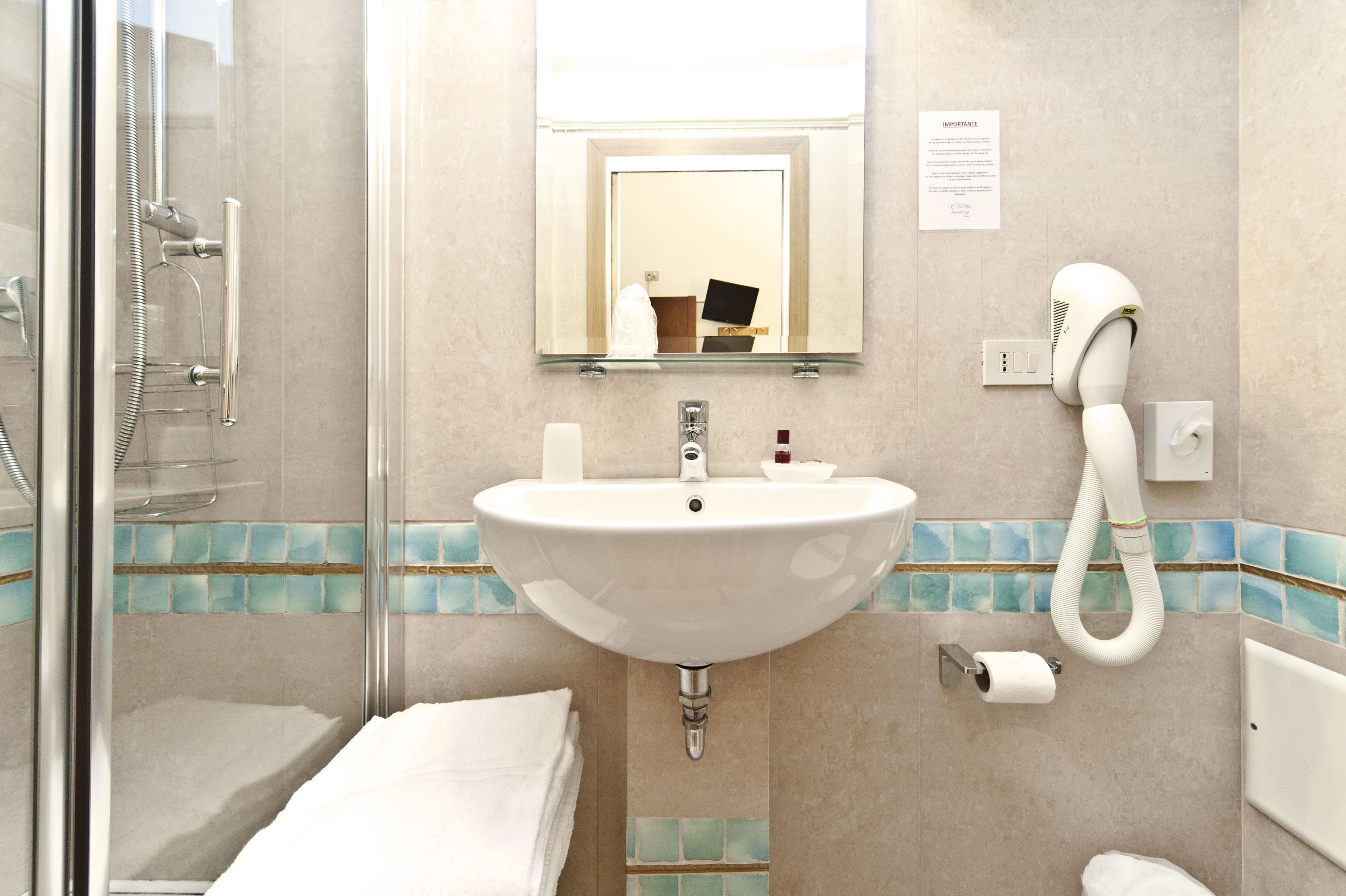 economy double room | bathroom | free toiletries, hair dryer, towels