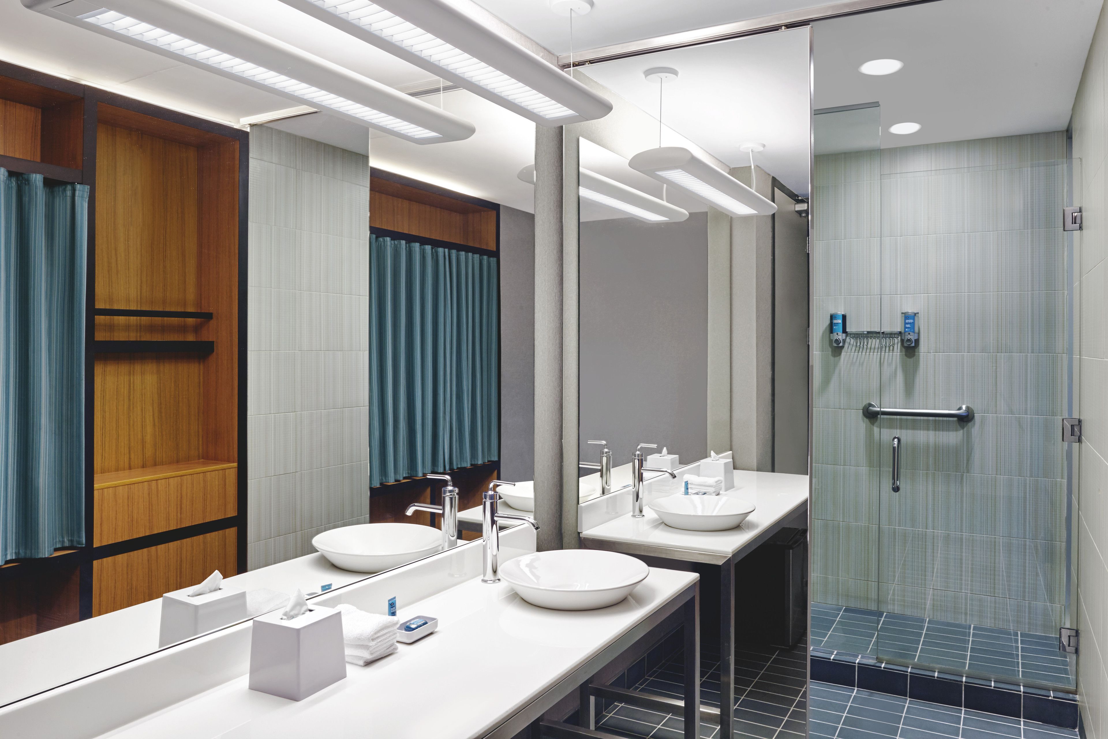 shower, designer toiletries, hair dryer, towels