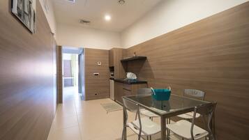 Apartment, 1 Bedroom | Living area | LCD TV