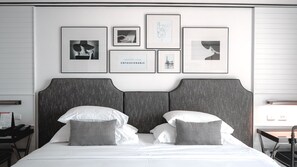 Chic Deluxe | In-room safe, individually decorated, desk, blackout drapes