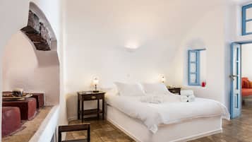 Suíte júnior (Caldera View) | Roupas de cama premium, camas com colchões pillow-top, frigobar