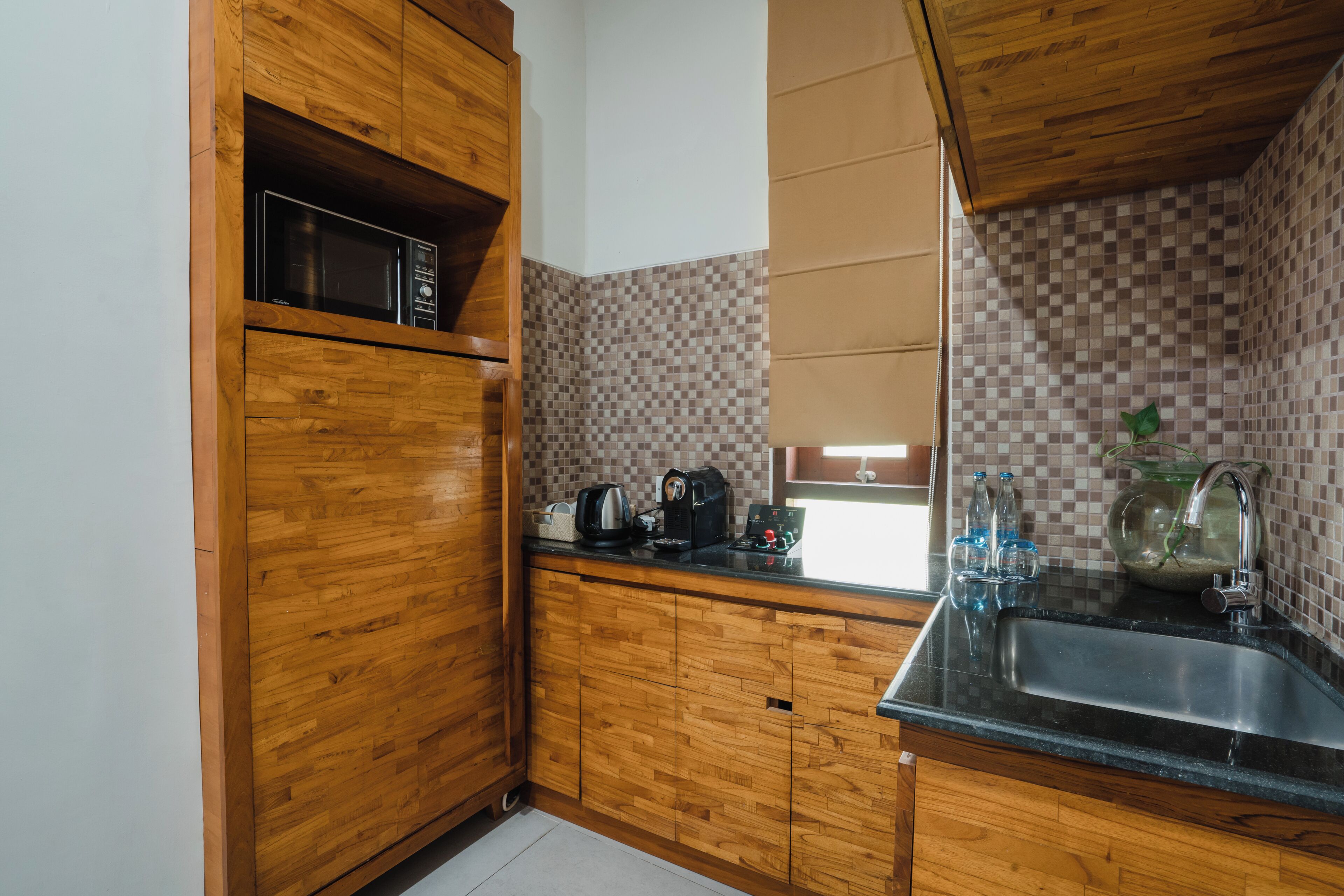 family room | 1 bedroom, minibar, in-room safe, desk