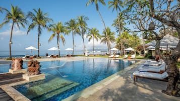 Outdoor pool, pool umbrellas, sun loungers