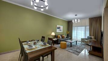 Standard Apartment, 1 Bedroom | Living room | Flat-screen TV