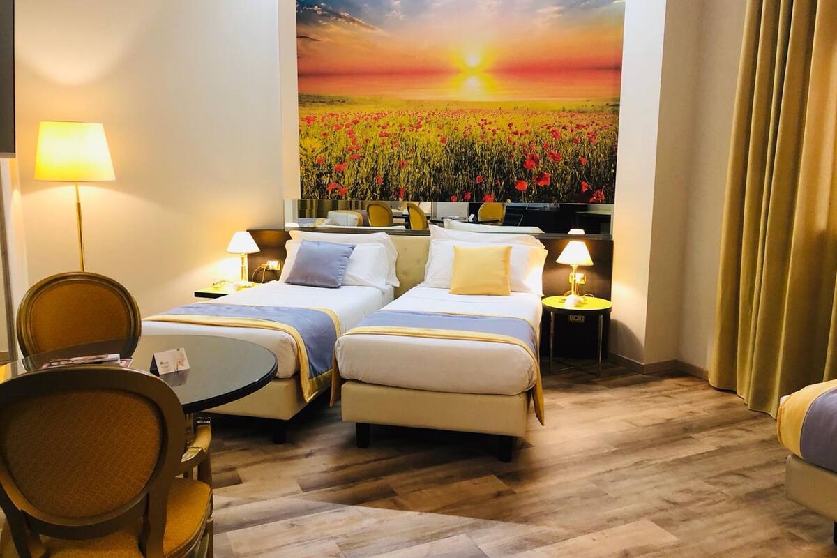 standard twin room | down duvets, minibar, in-room safe, desk