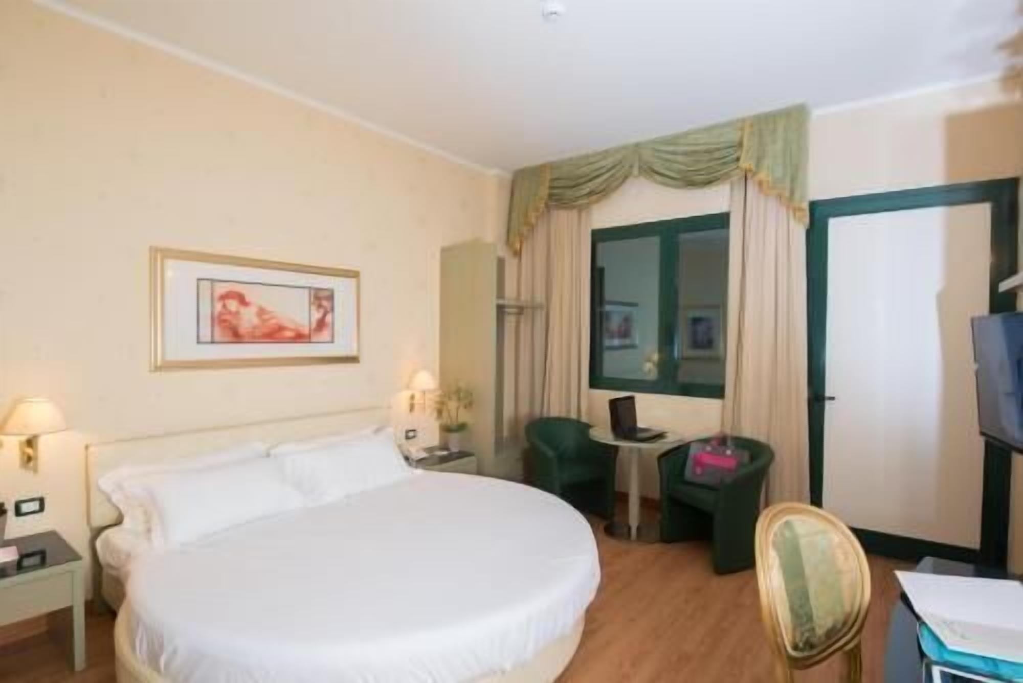 Down comforters, minibar, in-room safe, desk