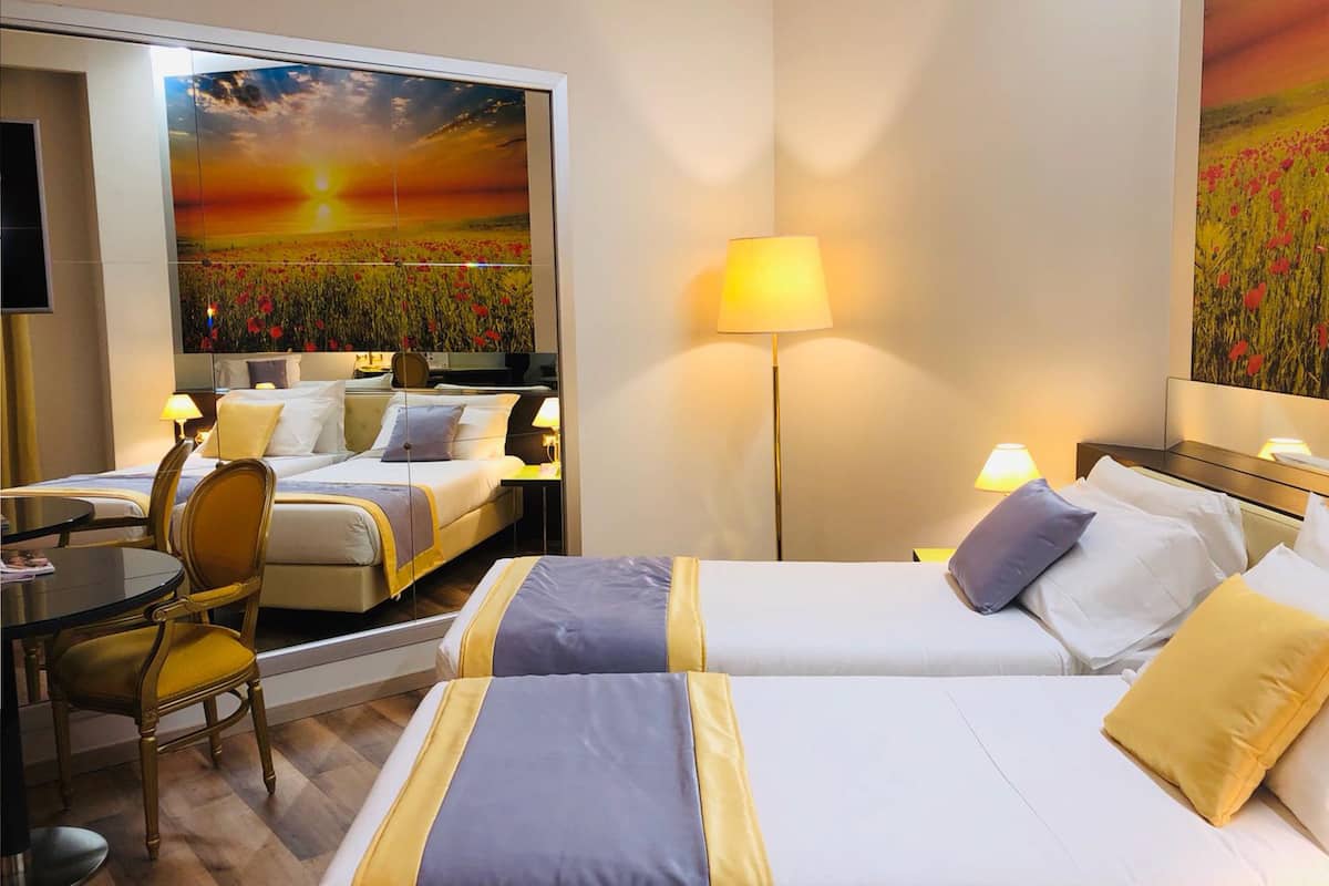 standard twin room | down duvets, minibar, in-room safe, desk