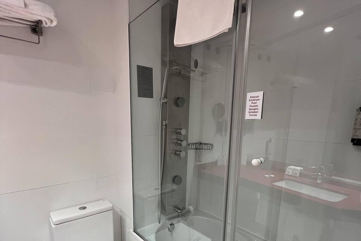 single room | bathroom | hair dryer, towels, soap, shampoo