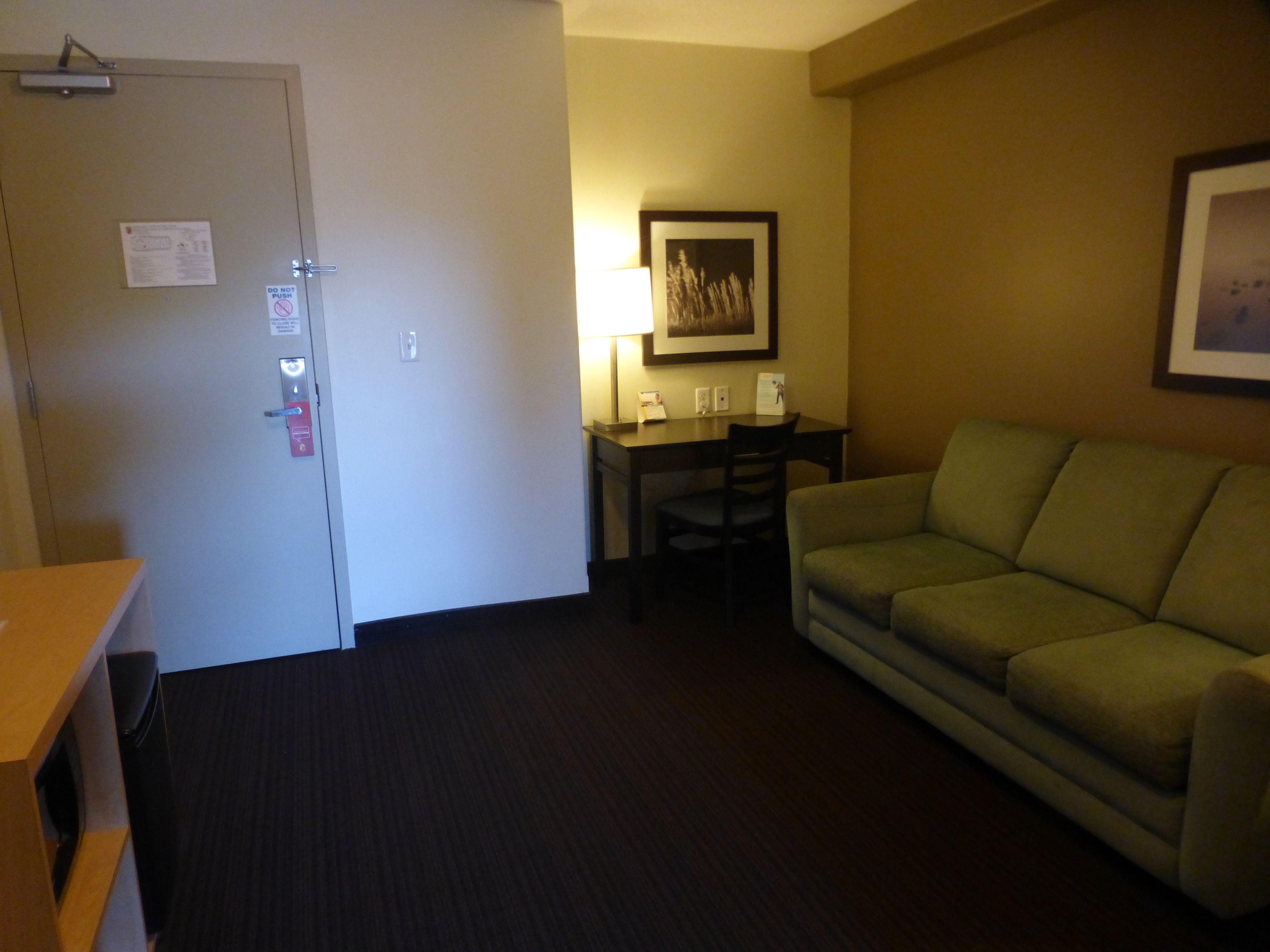 suite, 1 king bed with sofa bed, non smoking (1 king bed and 1 sofa bed) | living area | flat-screen tv