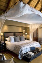 Suíte (Tinga) | Roupas de cama premium, frigobar (abastecido com itens grátis)