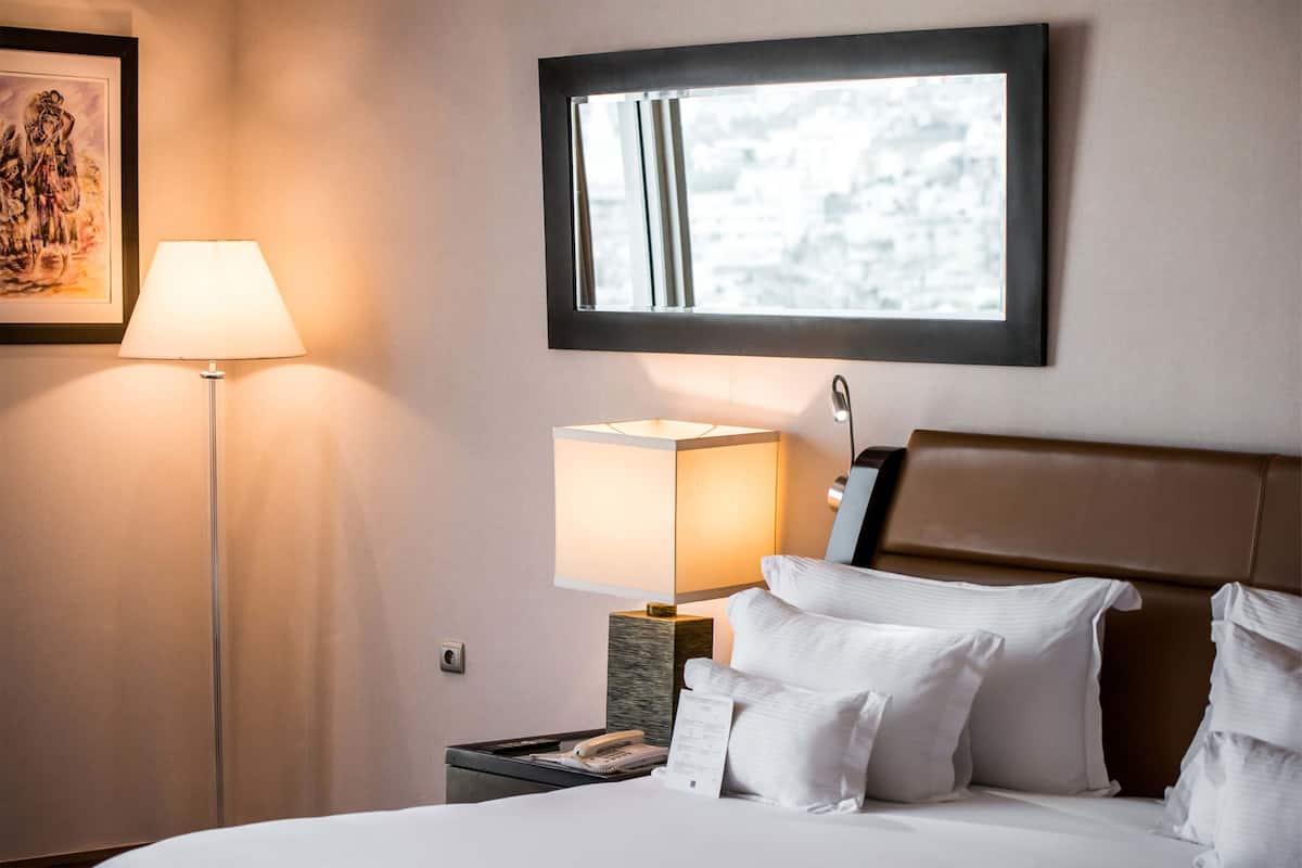 Premium bedding, pillow-top beds, minibar, in-room safe