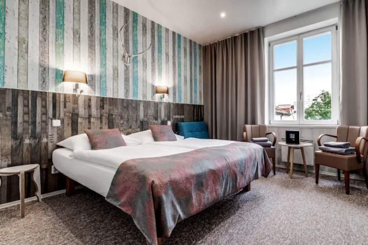 Ropa de cama de alta calidad y minibar