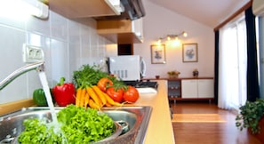 Deluxe Apartment, Terrace, Sea View (4+3) | Private kitchen | Full-size fridge, stovetop, coffee/tea maker, electric kettle