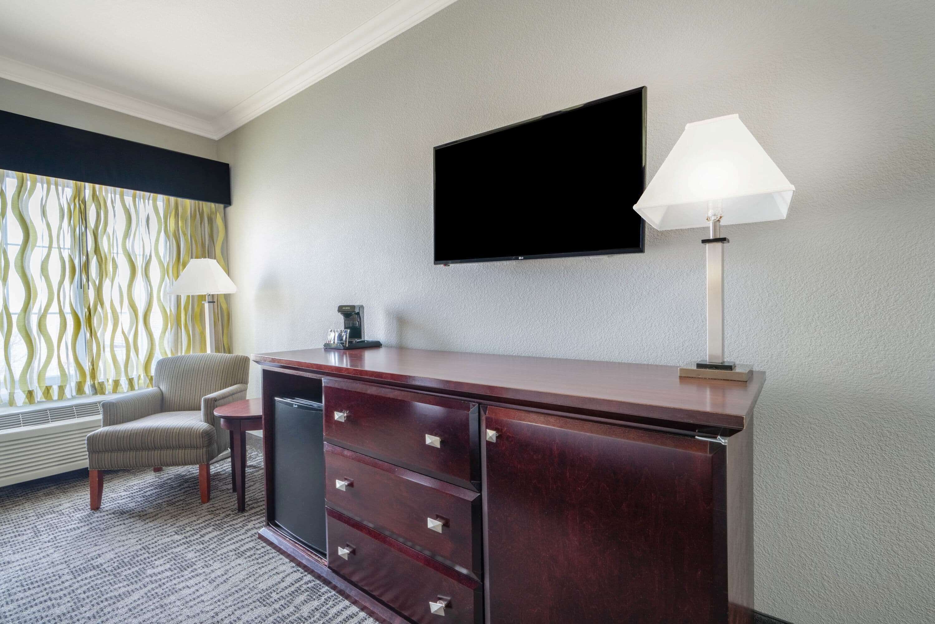 suite, 1 king bed, non smoking | premium bedding, desk, blackout curtains, iron/ironing board